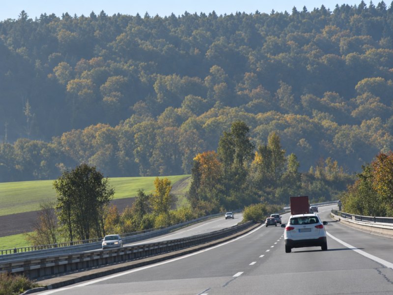 On a road outside of town with more than one lane in either direction, what is the speed limit?