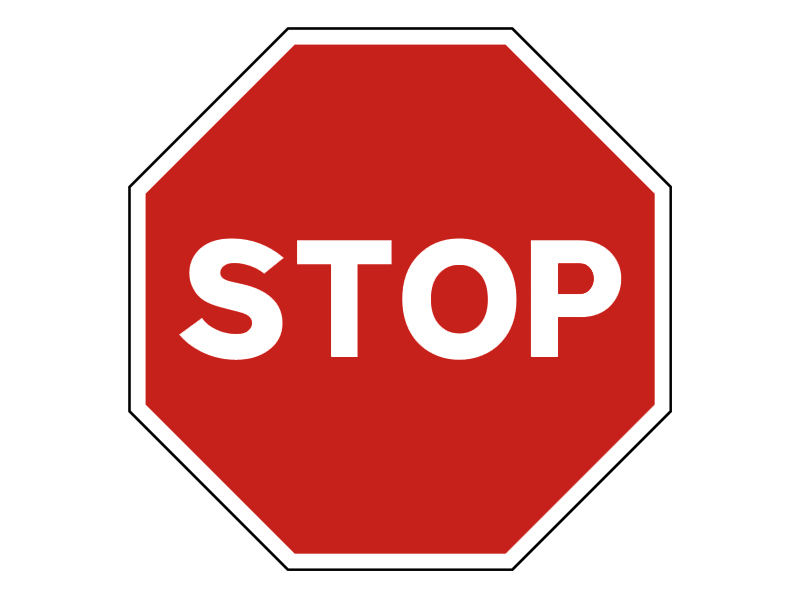 At the sign depicted in the image, what must you do?