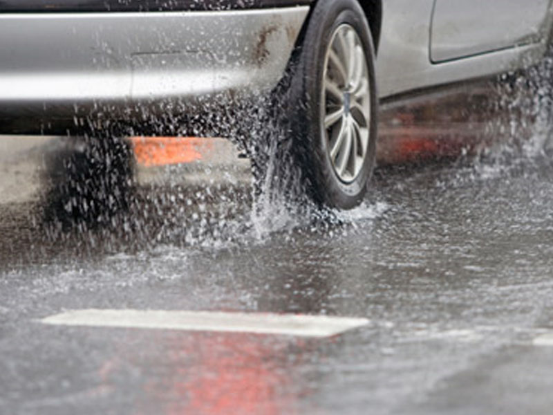 If your vehicle's brakes become wet, you should be aware that...