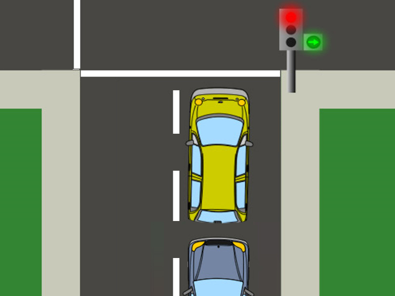 The yellow car in the picture is stopped because its driver wants to go straight ahead. According to the signage, what…