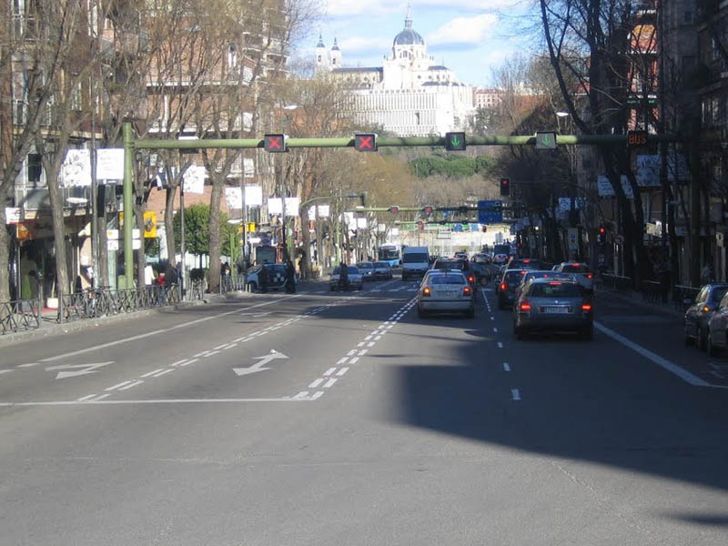 The reversible lane is open. Are you allowed to cross the left double broken line to overtake?