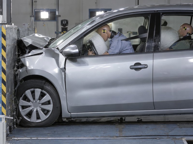 In a head-on collision, under what circumstances is a driver most likely to sustain a traumatic brain injury when…